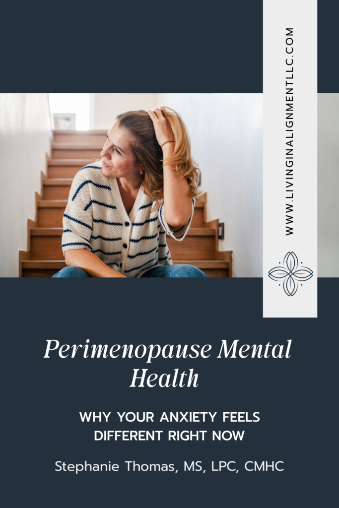 Woman holding her head in overwhelm, illustrating perimenopause anxiety and mood changes